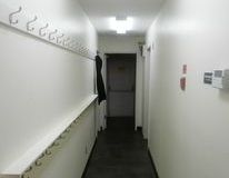 Washroom corridor with coat hooks